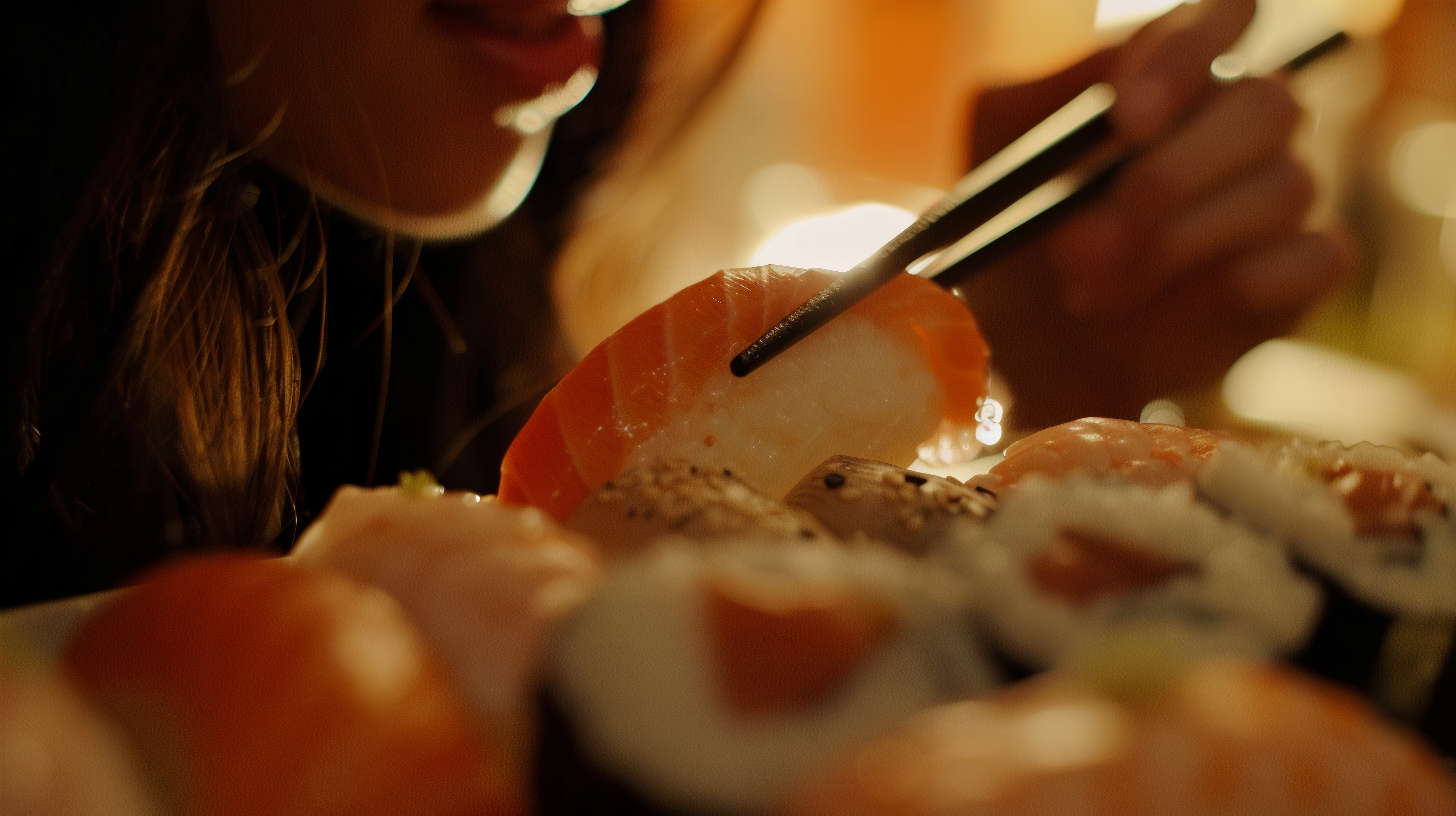 close-up-person-eating-sushi.jpg