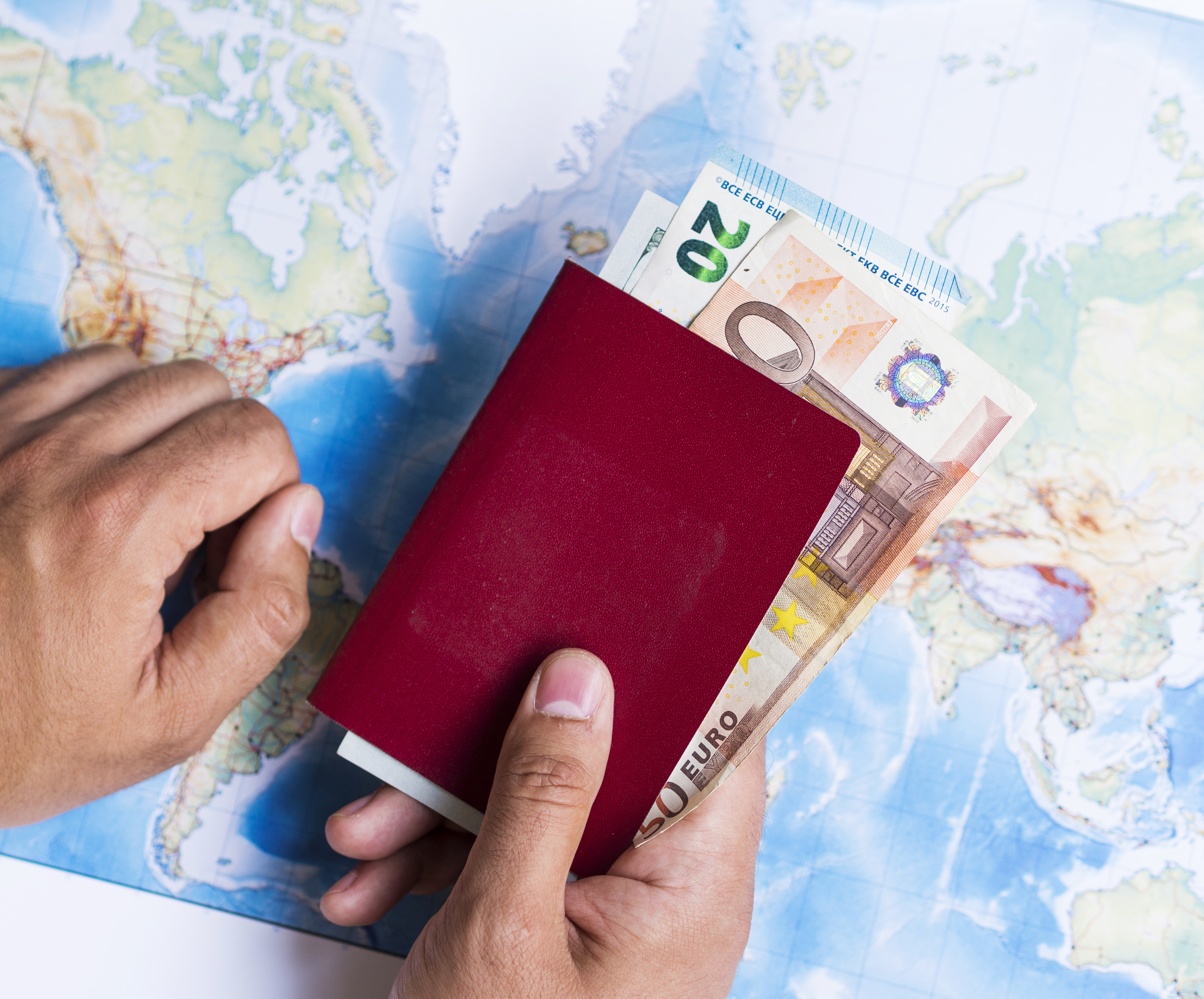 closed-wallet-with-euros-world-map.jpg