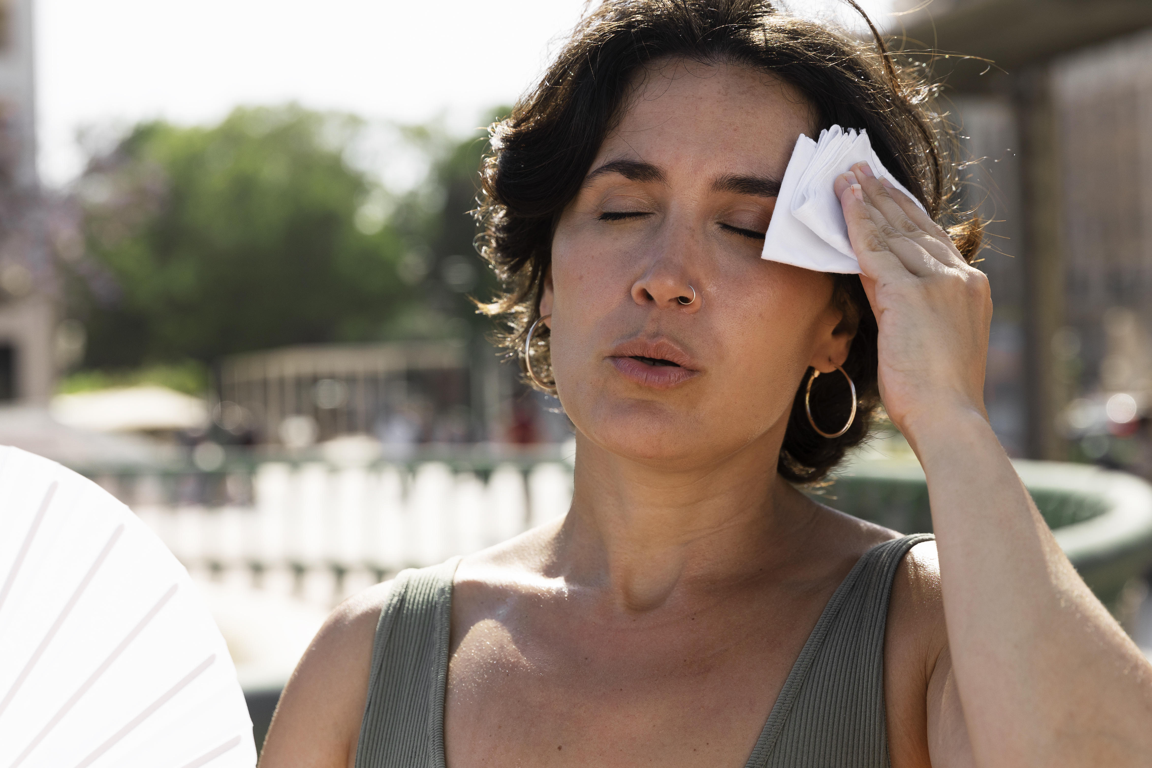 elder-woman-struggling-with-high-temperature.jpg