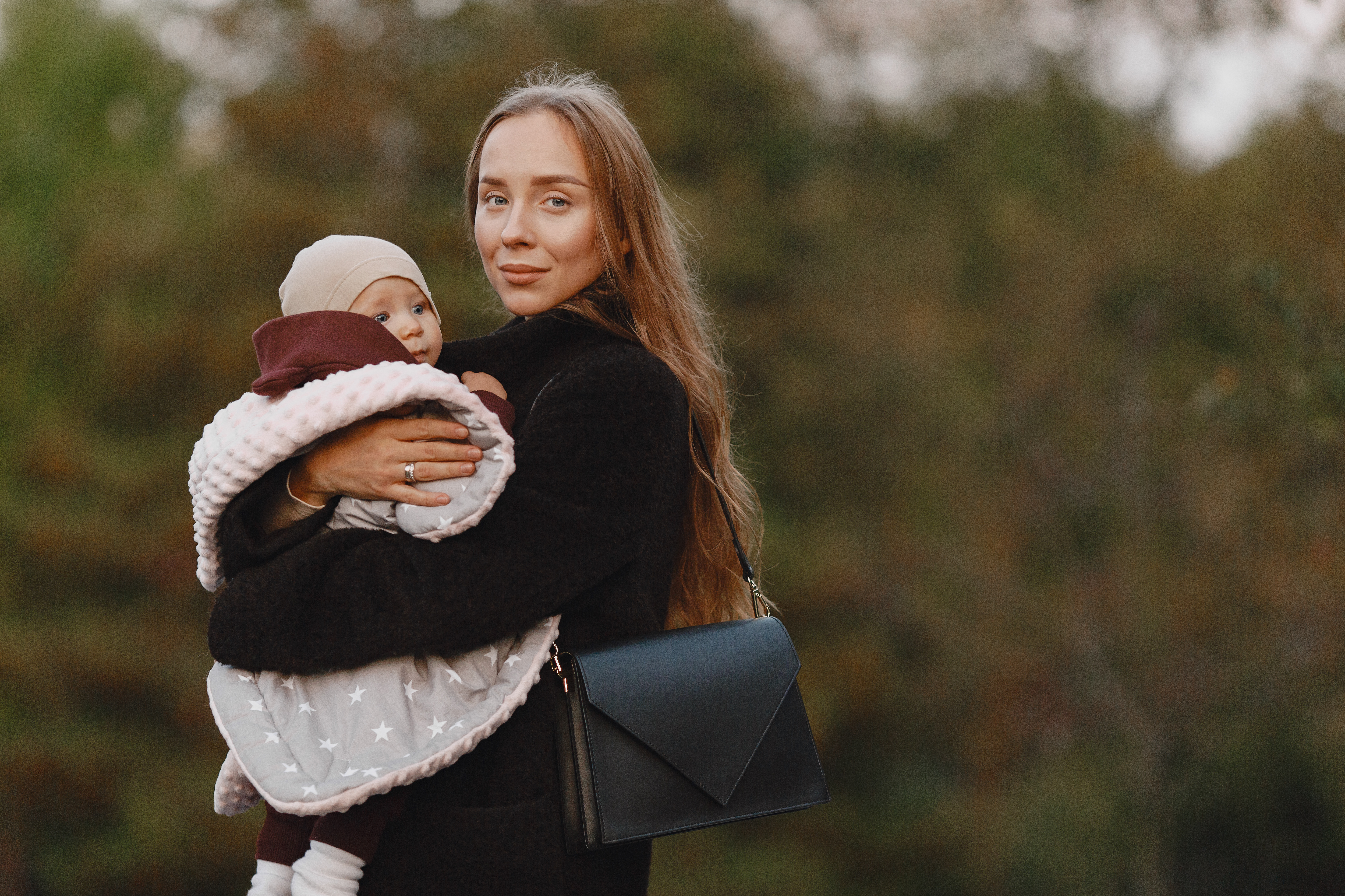 fashionable-mother-with-daughter-people-walks-outside-woman-black-jacket.jpg