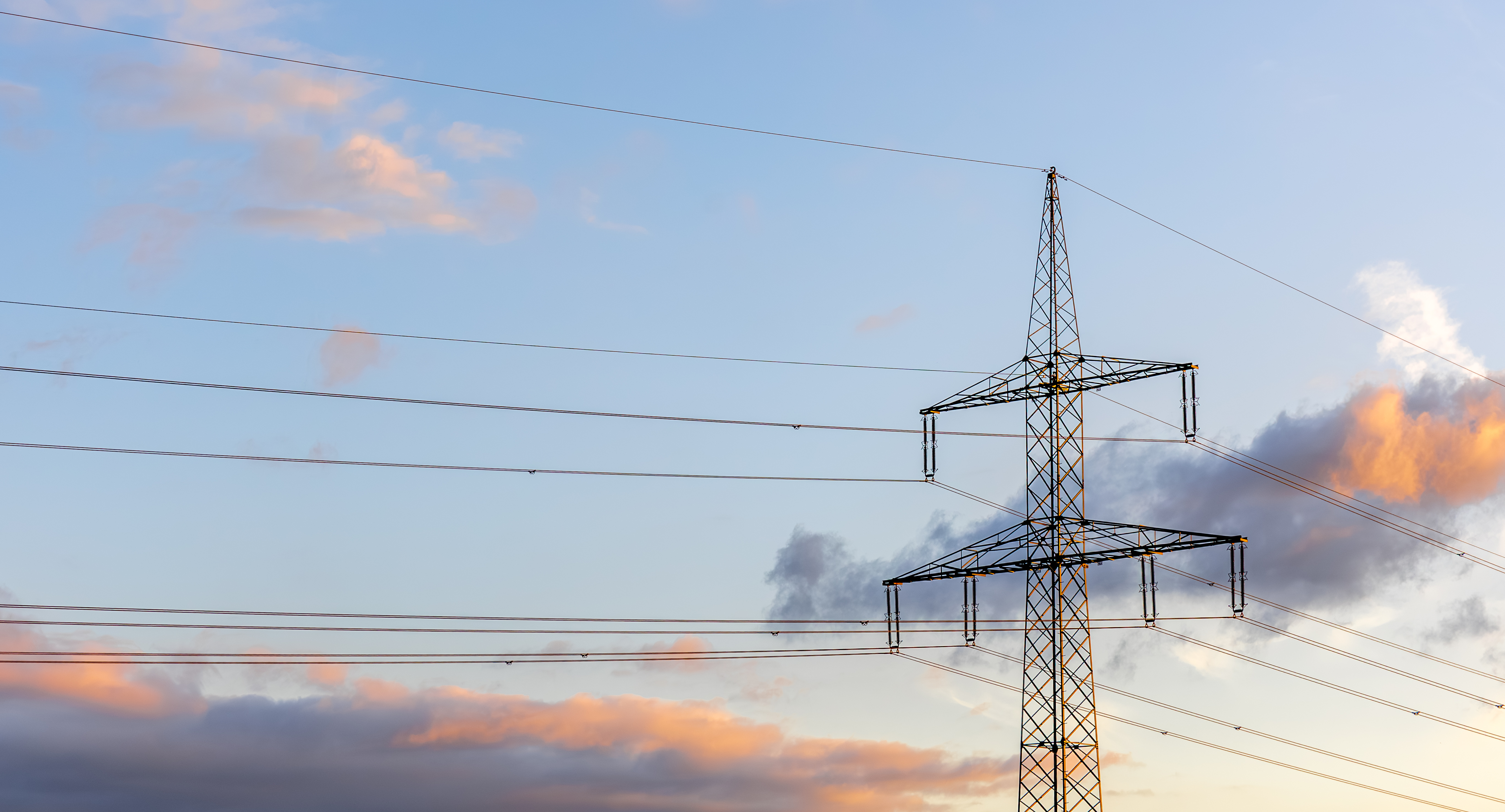 highvoltage-line-sunset-electricity-modern-design.jpg