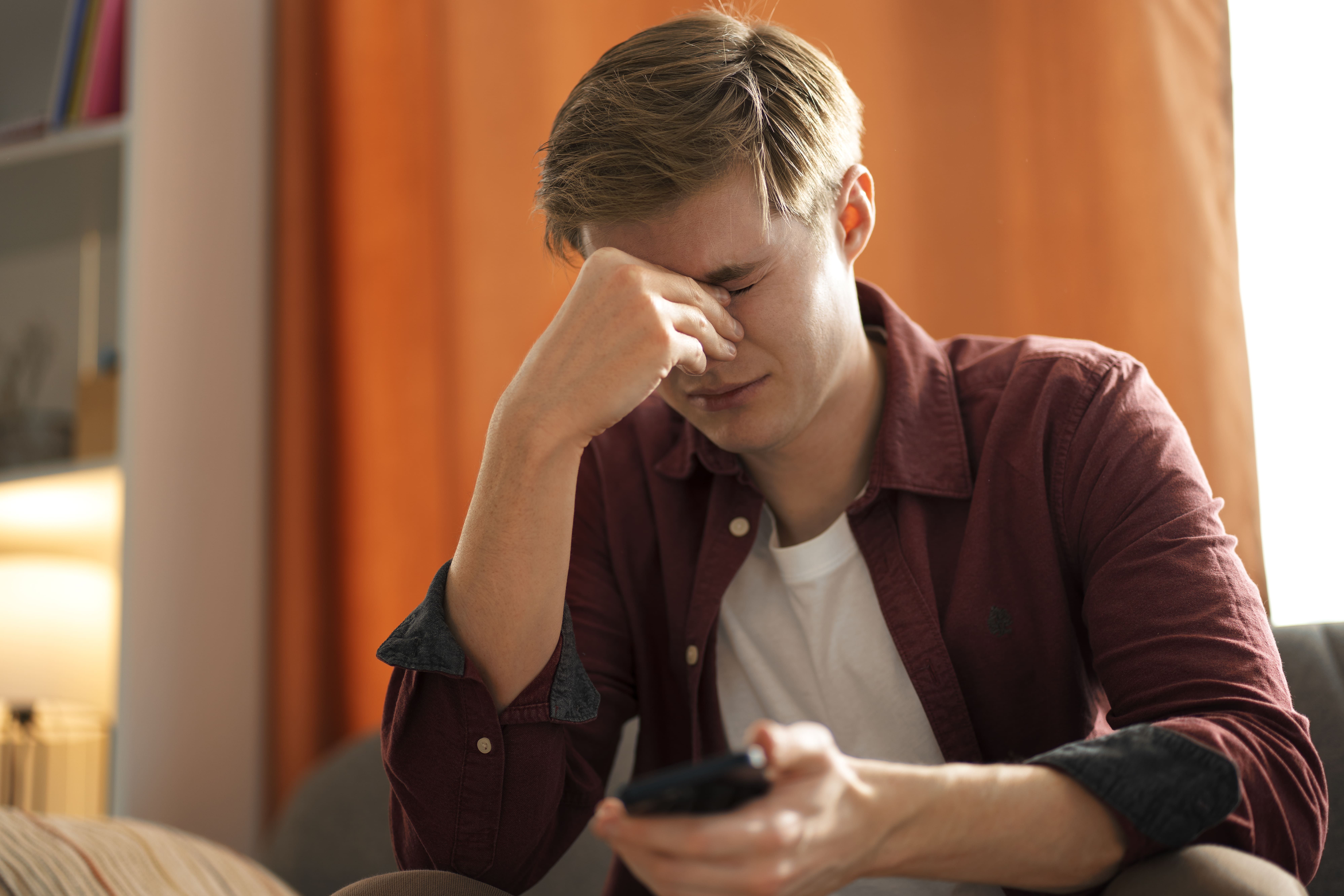 medium-shot-suffering-teenager-being-cyberbullied-2.jpg