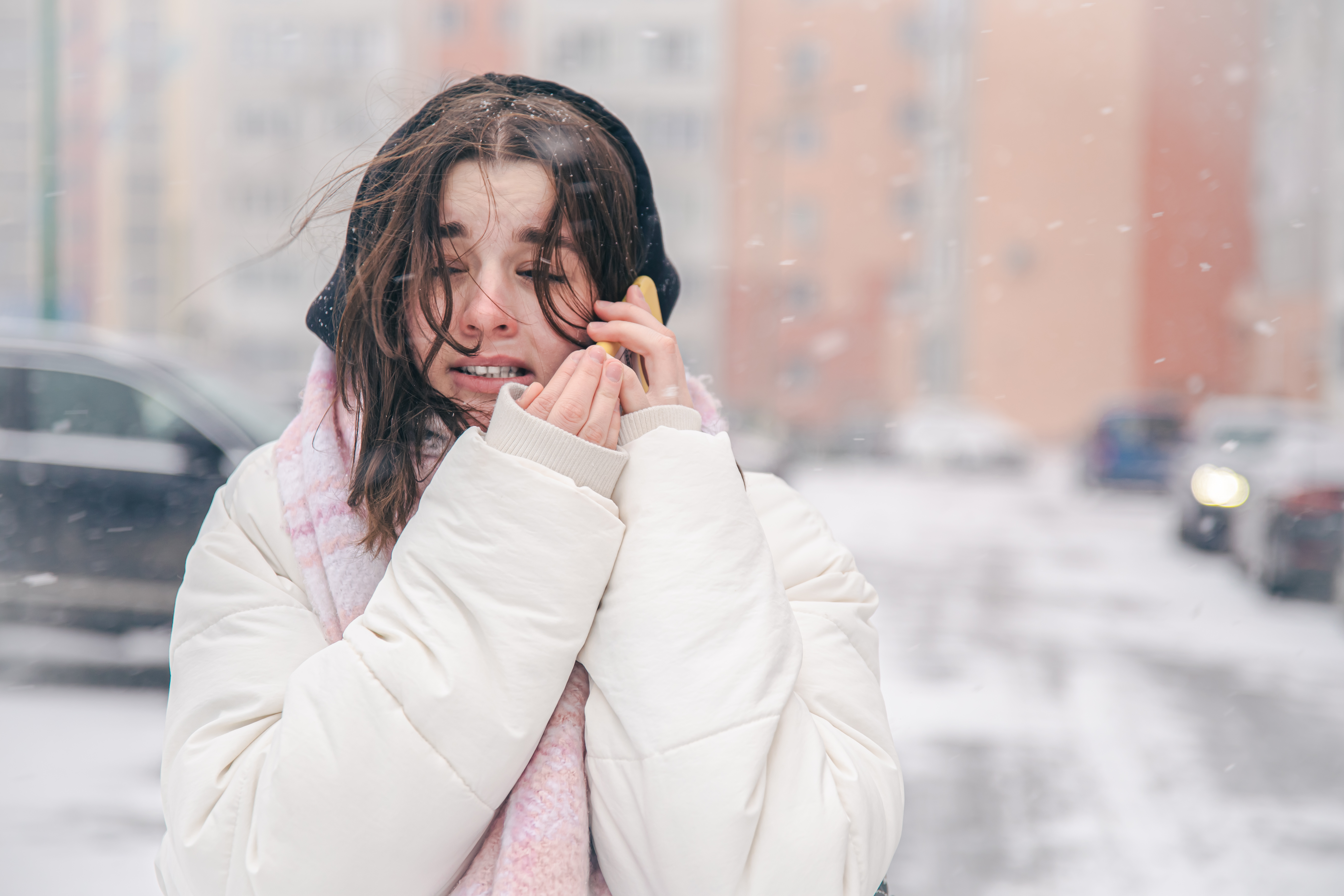 portrait-teenage-girl-outdoors-with-smartphone-snowy-winter-weather.jpg