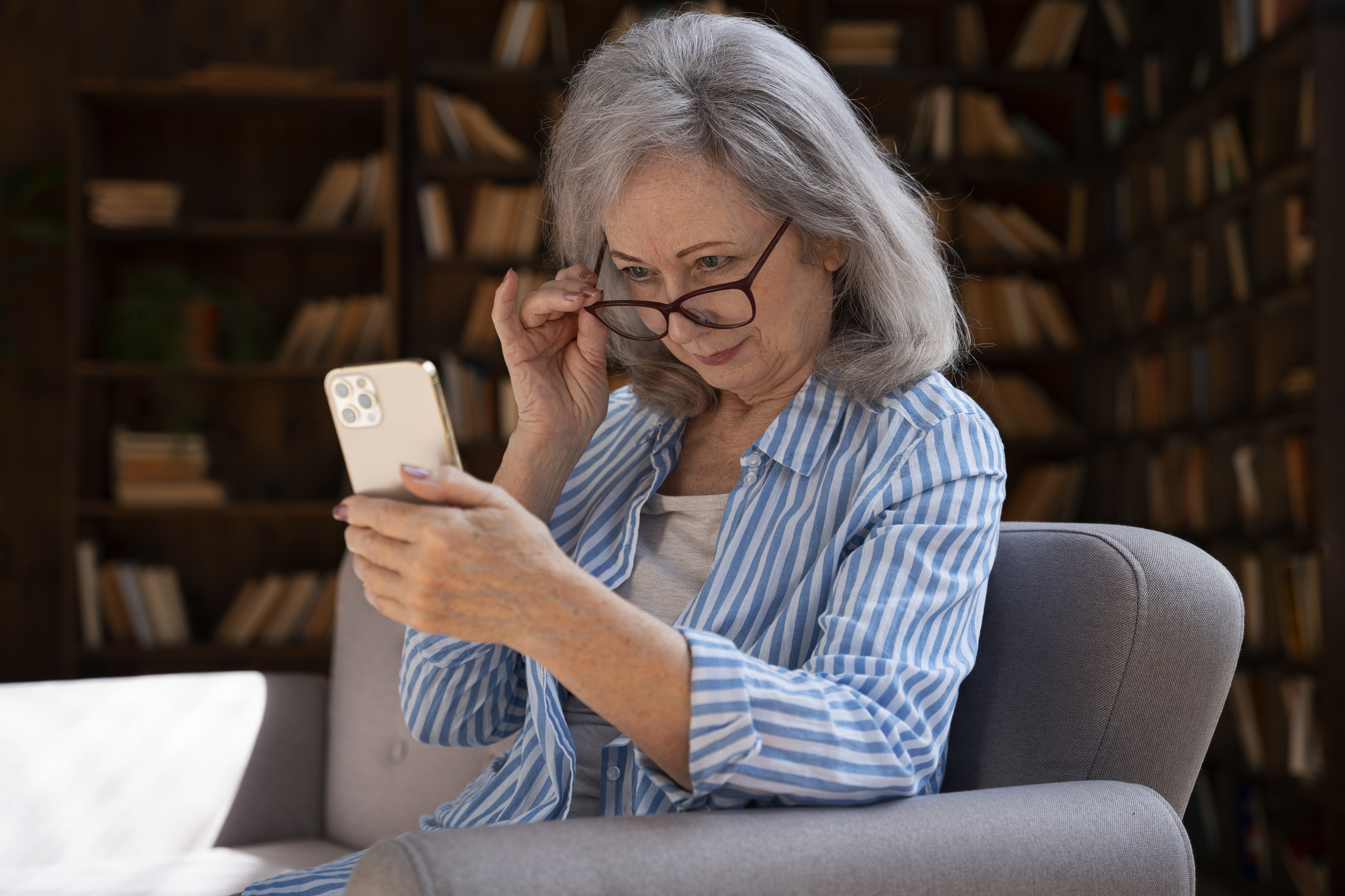 medium-shot-old-woman-library.jpg